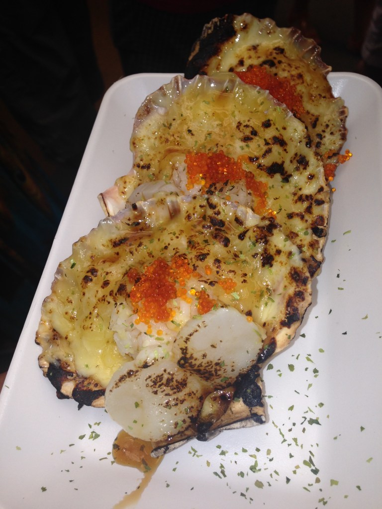 Scallops smothered with cheese