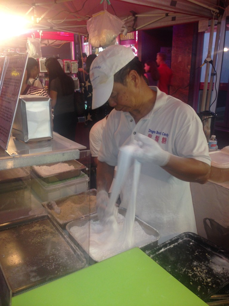 Making dragon beard candy at the Chinese New Year Temple fair